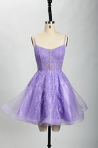 A mannequin displays a royal - blue, short - length gown with thin straps. The bodice and skirt are adorned with sparkling sequins and floral lace. The tulle skirt adds a fluttery, feminine touch, perfect for semi - formal events like homecoming or cocktail parties, exuding youthful charm.6