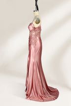 A mannequin displays a rose - gold satin gown. It has thin straps, off - shoulder lace - detailed sleeves, a ruched bodice, and a high side slit. The elegant design, blending satin and lace, suits formal events like galas or weddings.7