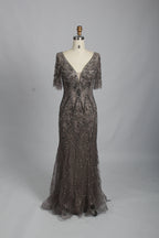 Dark silver beaded lace V-neck evening dress with long sleeves, fitted and flared hem