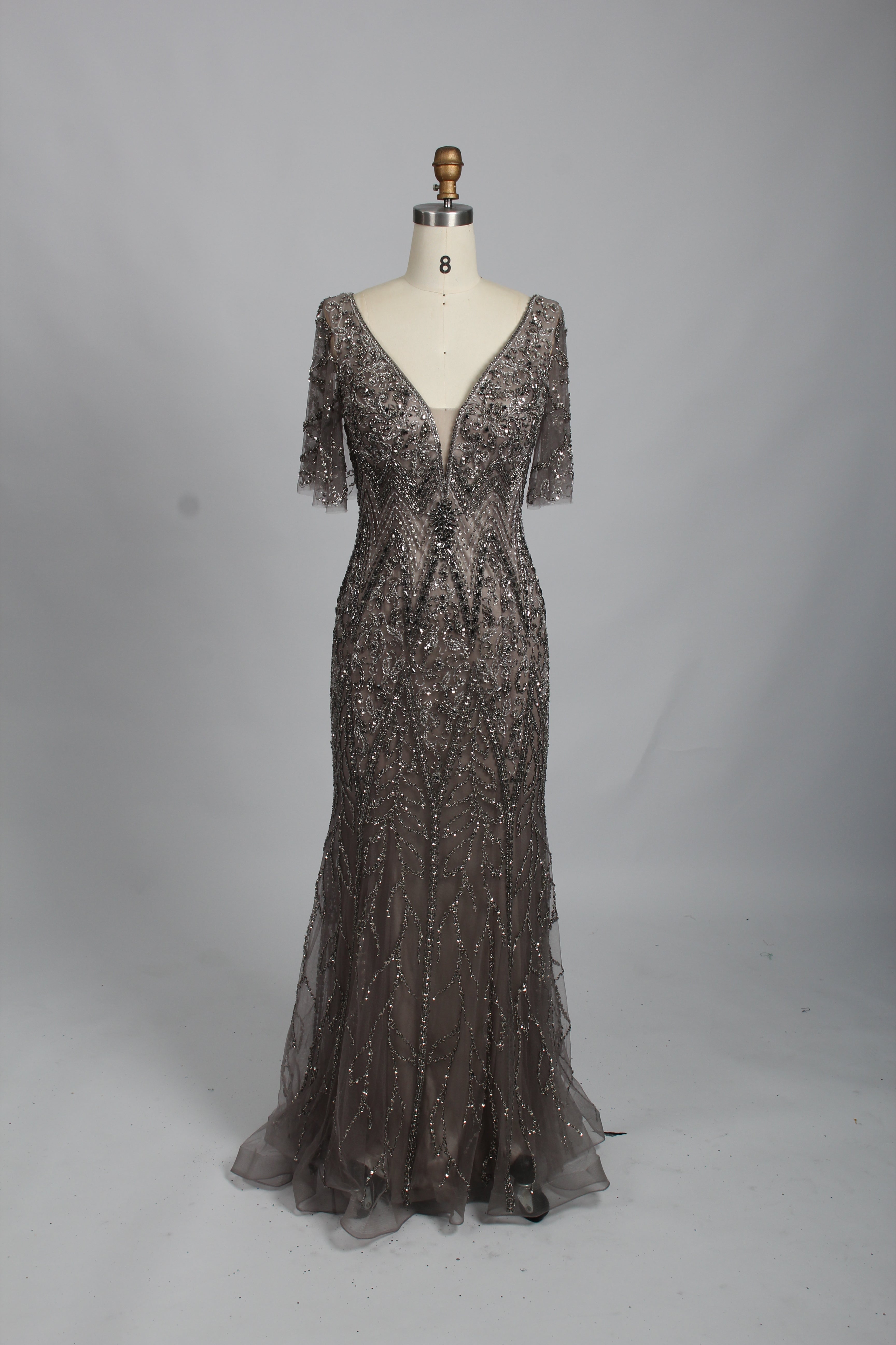 Dark silver beaded lace V-neck evening dress with long sleeves, fitted and flared hem