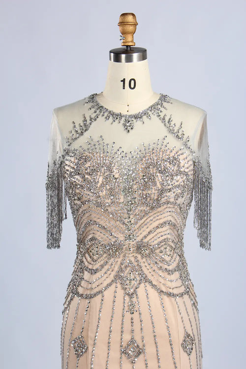 Champagne beaded mermaid gown with scalloped neckline and short fringe sleeves