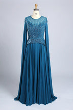 Teal beaded chiffon A-line dress with long sleeves and draped cape styling