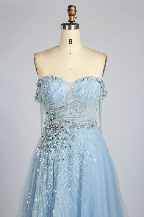 Light blue strapless A-line evening dress with sparkling beaded waist and tulle skirt