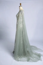 Silver sage beaded evening gown with flowing sheer cape sleeves and tulle skirt