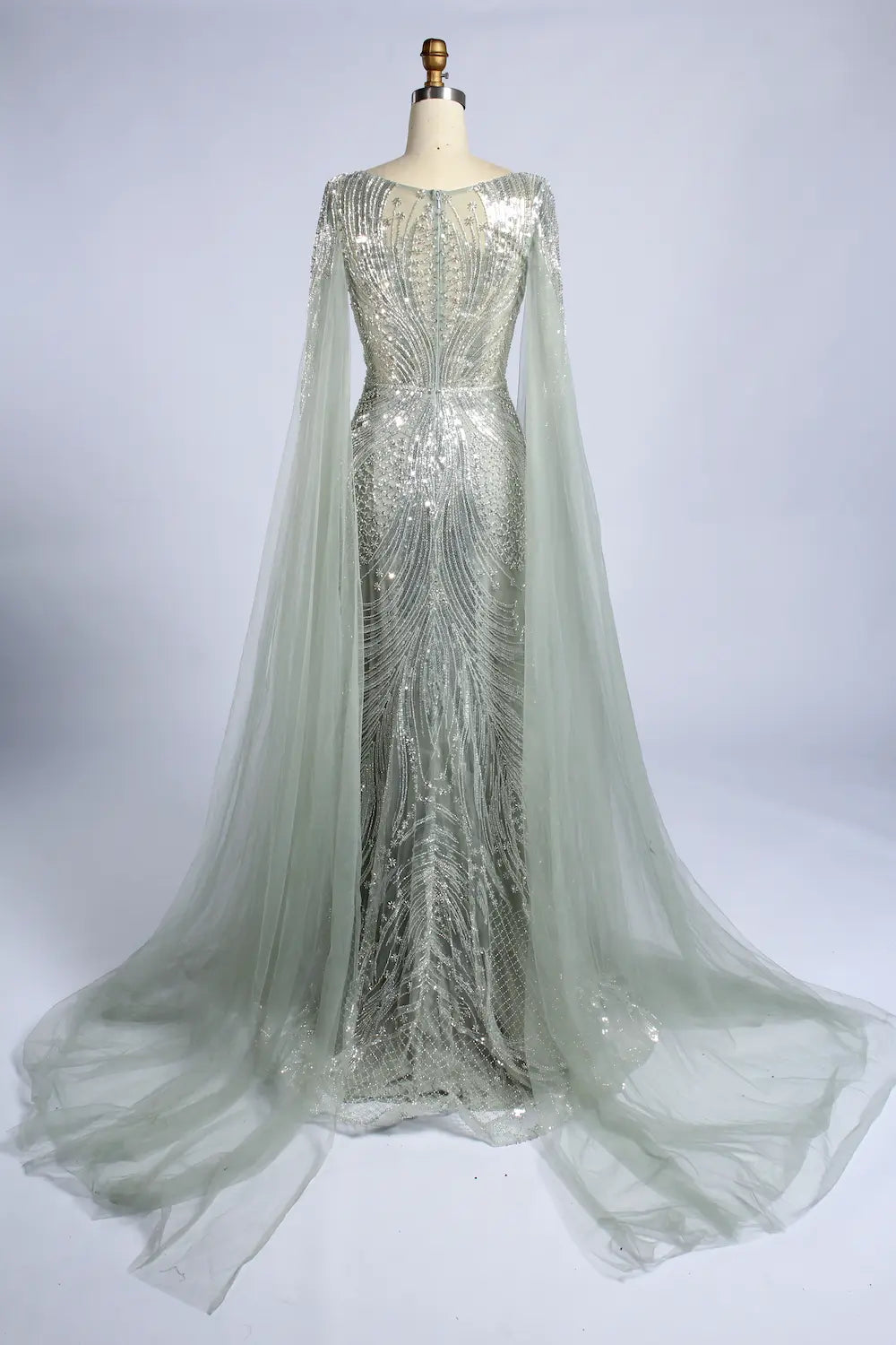 Silver sage beaded cape fit-and-flare gown with draped sheer sleeves and train
