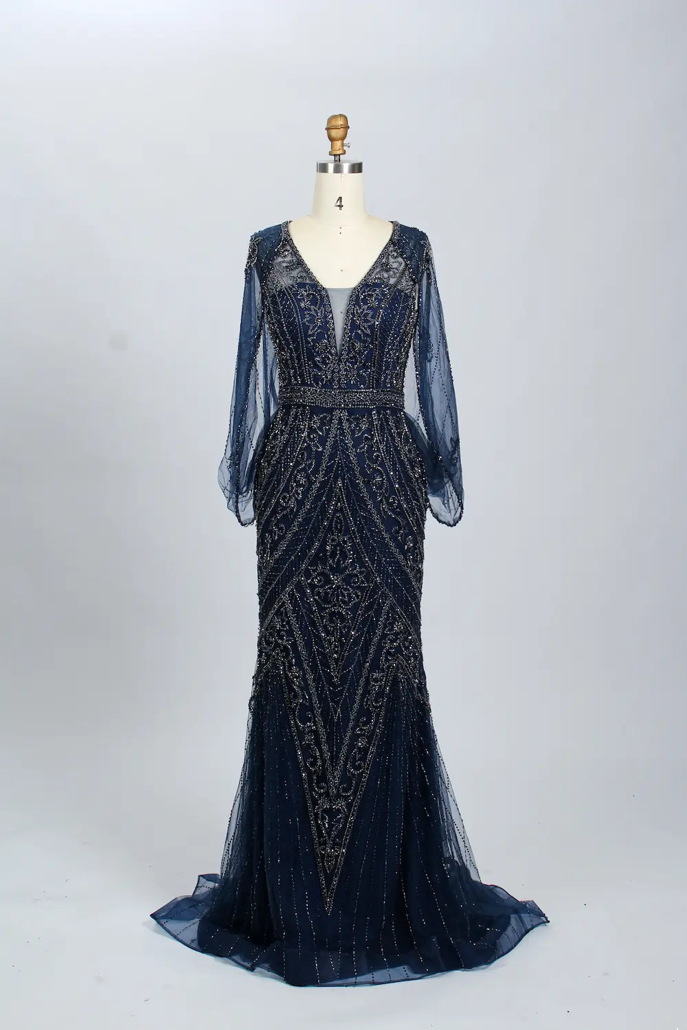 Navy beaded V-neck mermaid gown with sheer long sleeves and ornate scalloped trim