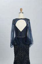 Dark navy beaded tulle evening dress with V-back and sheer long sleeves