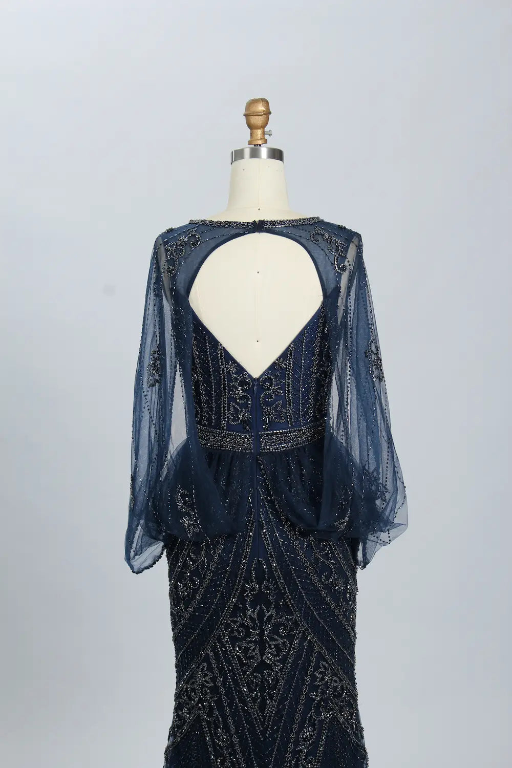 Dark navy beaded tulle evening dress with V-back and sheer long sleeves
