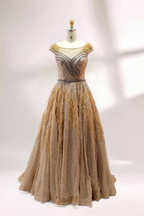 Gold glitter tulle mother dress with feathered cap sleeves and full tiered skirt