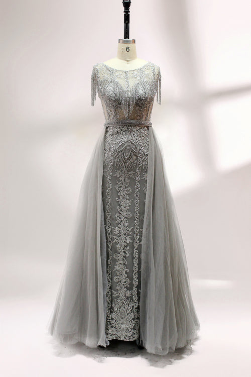 Silver-gray tulle evening dress with embroidered bodice, cap sleeves, and flowing skirt