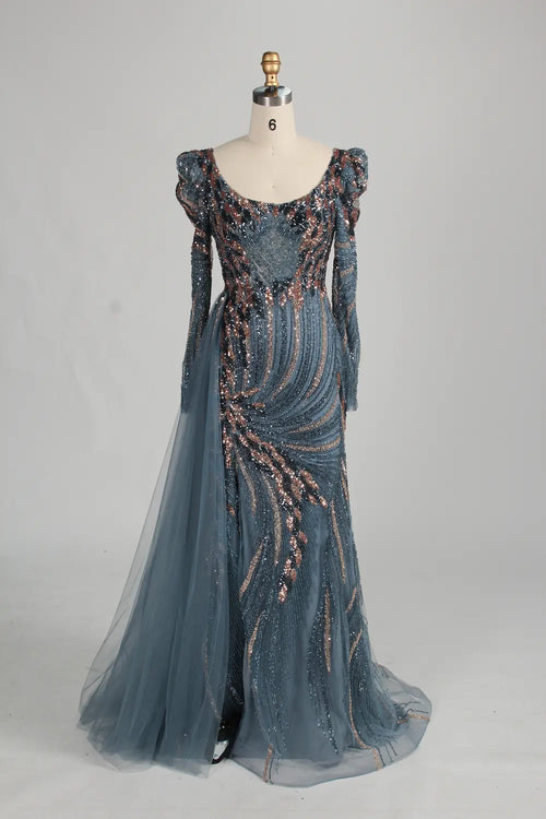 Navy blue sequined evening gown with beaded long sleeves and flowing tulle skirt