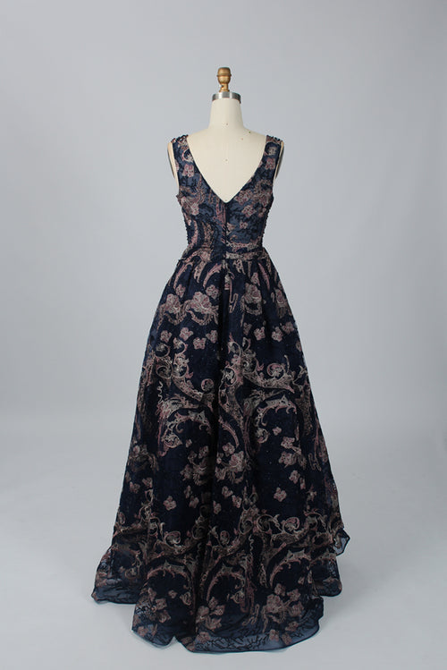 Black embroidered tulle dress with V-neck bodice and tiered full skirt