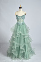 Sage green corset strap prom dress with layered ruffle tulle skirt