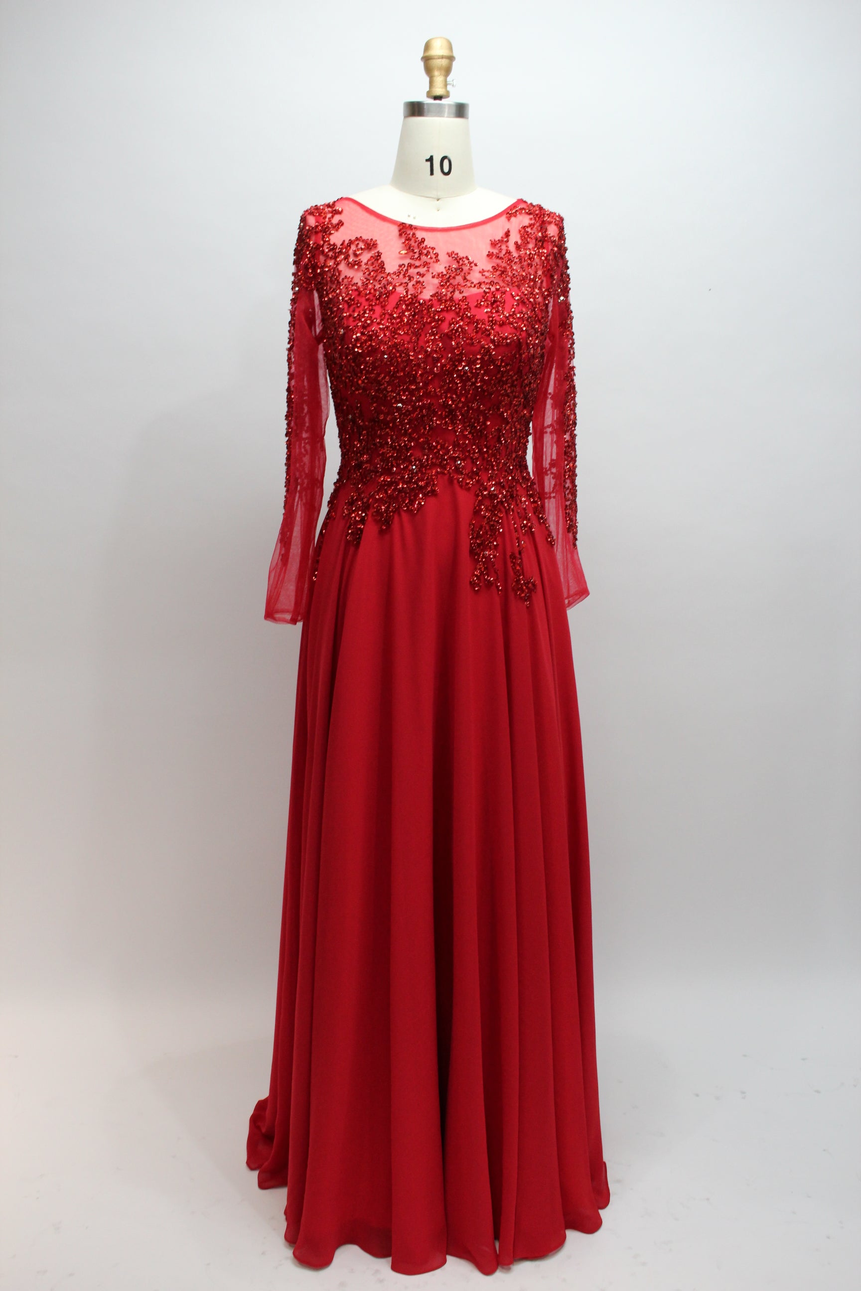 Red sequin lace long-sleeve dress with sheer sleeves and flowing full skirt