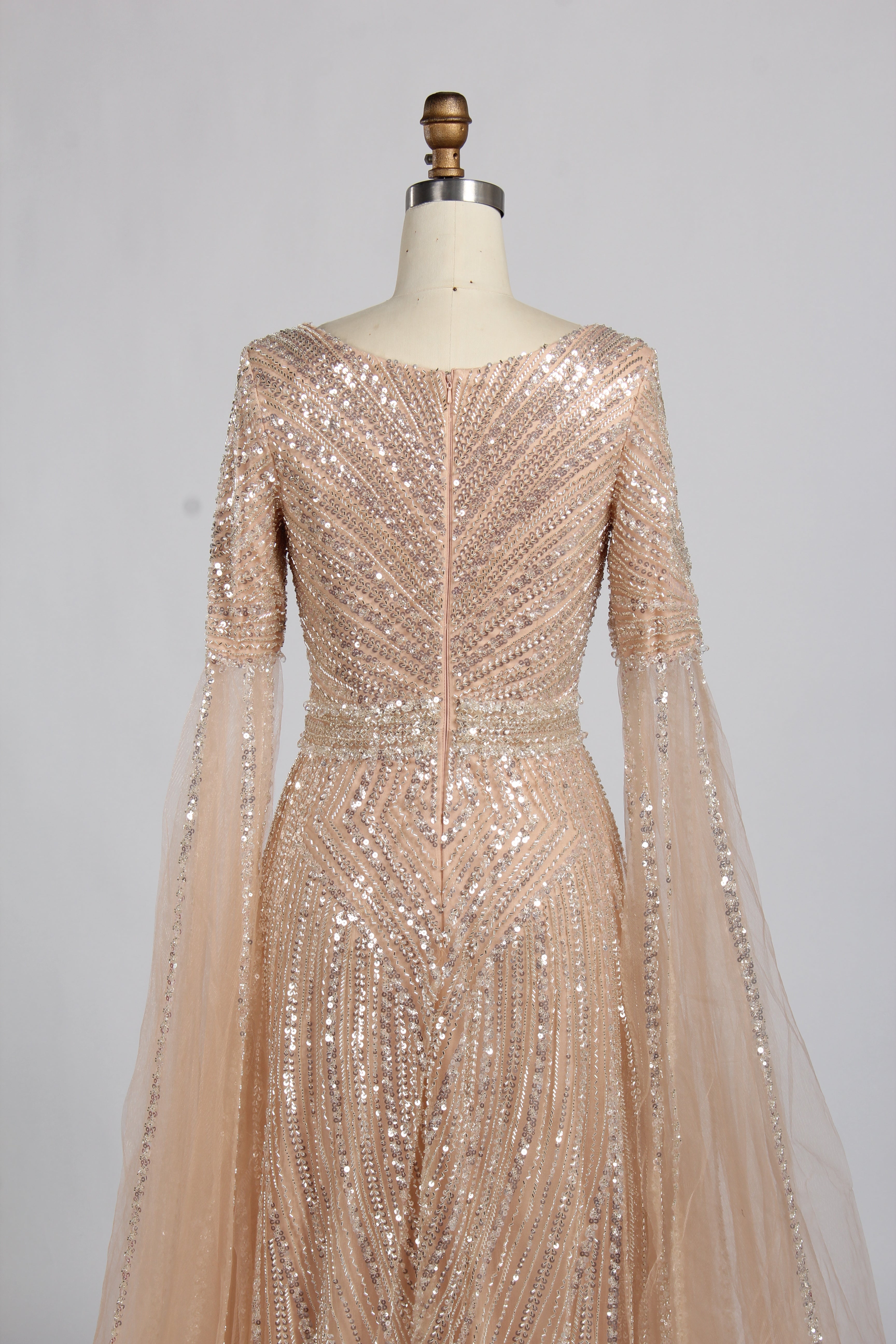 Champagne sequin V-neck back evening gown with fitted waist and A-line tulle skirt