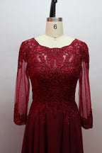 Burgundy beaded bodice with illusion yoke and long sheer chiffon sleeves