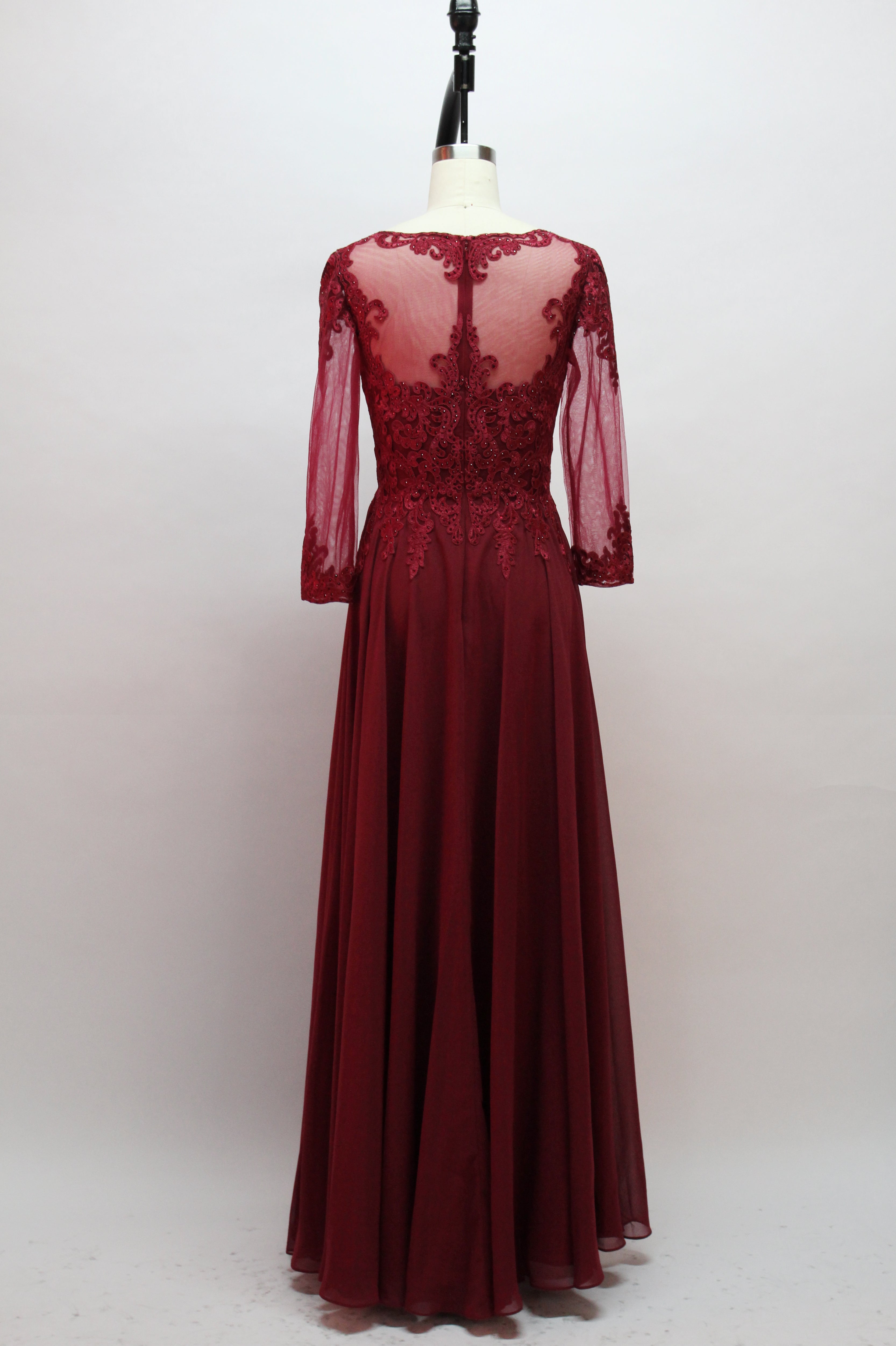 Front view of an elegant burgundy A-line mother of the bride dress featuring a scoop neck bodice with intricate beaded lace detailing, sheer long chiffon sleeves, and a long flowing floor-length chiffon skirt, suitable for weddings and formal evening galas and available for wholesale or bulk purchase.
