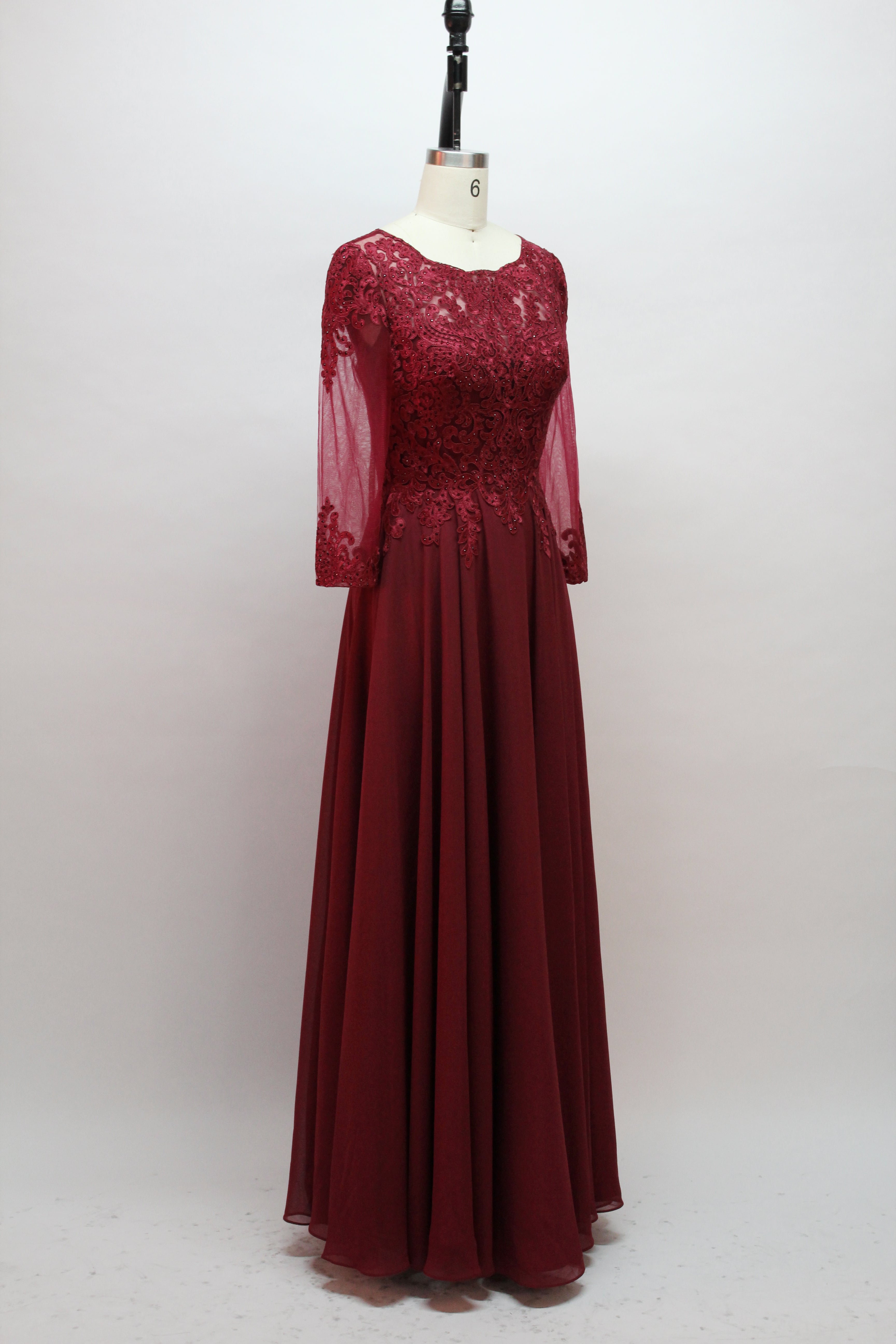 Burgundy beaded gown with sweetheart neckline and long sheer chiffon sleeves